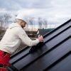 man-working-roof-medium-shot